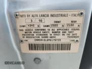 ✅ 1991 Alfa Romeo 164 • VIN: ZAREA43L6M6178729 • Lot: 87283915. Listed on Copart with 104,137 mi. Free auction sales archive from the USA and detailed vehicle history report at DreamBid. Image 12.