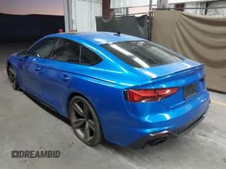 ✅ 2022 Audi RS 5 Sportback • VIN: WUAAWCF51NA902099 • Lot: 43455117. Wystawiony na IAAI z przebiegiem 53 874 mil. Bezpłatny archiwum sprzedaży aukcyjnych z USA i szczegółowy raport historii pojazdu na DreamBid. Zdjęcie 3.