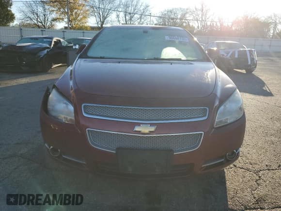 ✅ 2010 Chevrolet Malibu LTZ • VIN: 1G1ZE5E79AF131303 • Лот: 90698135. Опубликован ранее на Copart с пробегом 99 314 миль. Бесплатный доступ к архиву аукционных продаж из США и подробный отчёт об истории автомобиля на DreamBid. Изображение 5.