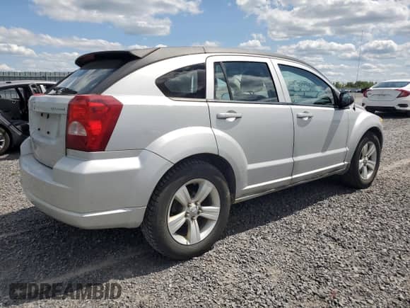 2011 Dodge Caliber Uptown с VIN 1B3CB9HA3BD190642, выставлен на аукционе Copart как лот 67273325 с пробегом 157 683 миль миль и Чистый • Clean title. История ставок и продаж доступна на DreamBid. Изображение 3.