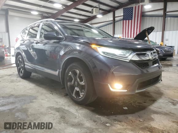 ✅ 2017 Honda CR-V Touring • VIN: 2HKRW2H96HH614845 • Лот: 89653965. Опубликован ранее на Copart с пробегом 119 518 миль. Бесплатный доступ к архиву аукционных продаж из США и подробный отчёт об истории автомобиля на DreamBid. Изображение 4.