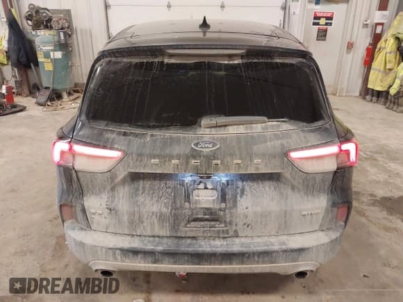 ✅ 2021 Ford Escape SE • VIN: 1FMCU9G64MUB17980 • Lot: 43614730. Listed on IAAI with 48,734 mi. Free auction sales archive from the USA and detailed vehicle history report at DreamBid. Image 16.