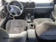 ✅ 2000 Isuzu Rodeo • VIN: 4S2DM58WXY4336906 • Lot: 69639245. Wystawiony na Copart z przebiegiem 176 214 mil. Bezpłatny archiwum sprzedaży aukcyjnych z USA i szczegółowy raport historii pojazdu na DreamBid. Zdjęcie 8.