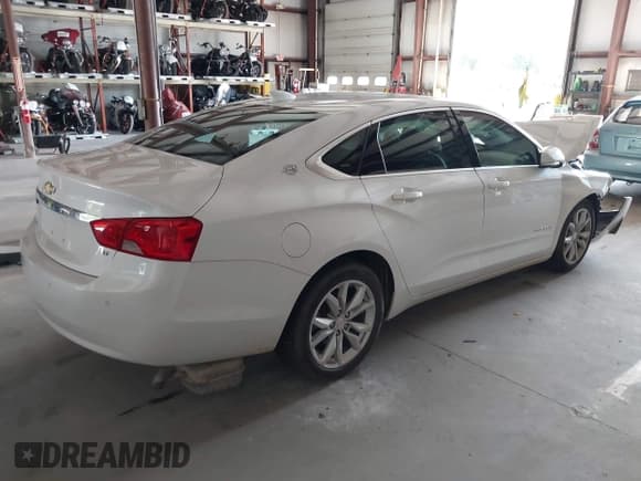✅ 2016 Chevrolet Impala LT • VIN: 1G1115S38GU163299 • Lot: 43014595. Listed on IAAI with 101,552 mi. Free auction sales archive from the USA and detailed vehicle history report at DreamBid. Image 4.