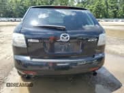 ✅ 2009 Mazda CX-7 Sport • VIN: JM3ER293390218622 • Lot: 64310045. Listed on Copart with 206,205 mi. Free auction sales archive from the USA and detailed vehicle history report at DreamBid. Image 6.