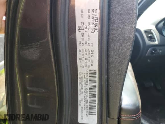 2018 Dodge Durango GT z VIN 1C4RDJDG7JC404857, wystawiony jako Copart lot #65951125 z przebiegiem 166 015 mil mil oraz Szkoda całkowita • Salvage title. Historia ofert i sprzedaży dostępna na DreamBid. Obrazek 13.