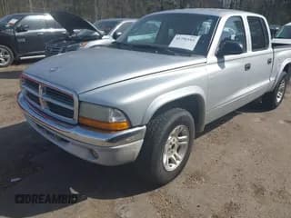 ✅ 2003 Dodge Dakota SLT • VIN: 1D7HL48N83S236590 • Lot: 41796103. Wystawiony na IAAI z przebiegiem 221 667 mil. Bezpłatny archiwum sprzedaży aukcyjnych z USA i szczegółowy raport historii pojazdu na DreamBid. Zdjęcie 2.
