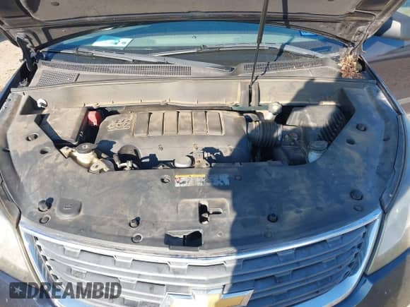 2015 Chevrolet Traverse LS z VIN 1GNKRFEDXFJ275799, wystawiony jako IAAI lot #43404084 z przebiegiem 150 564 mil mil oraz . Historia ofert i sprzedaży dostępna na DreamBid. Obrazek 10.