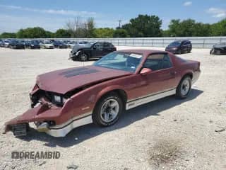 1987 Chevrolet Camaro with VIN 1G1FP21H1HL120950, listed as a Copart auction lot 63494474 with 25,249 mi miles and Salvage title. Bid and sale history available at DreamBid. Image 1.