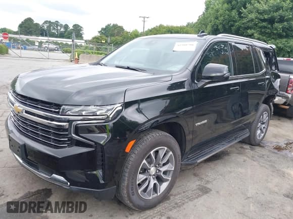 ✅ 2023 Chevrolet Tahoe LT • VIN: 1GNSKNKD8PR105849 • Lot: 42308786. Listed on IAAI with 51,748 mi. Free auction sales archive from the USA and detailed vehicle history report at DreamBid. Image 2.