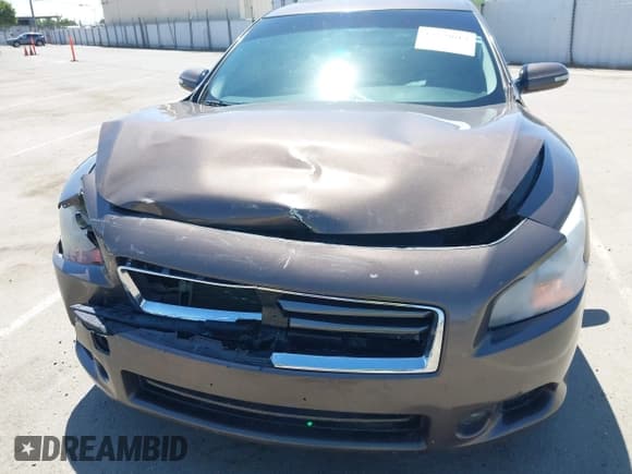 ✅ 2013 Nissan Maxima S • VIN: 1N4AA5AP0DC847265 • Lot: 42279613. Listed on IAAI with 128,765 mi. Free auction sales archive from the USA and detailed vehicle history report at DreamBid. Image 6.
