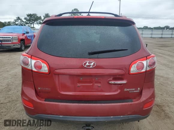 ✅ 2011 Hyundai Santa Fe Limited • VIN: 5XYZKDAGXBG004039 • Lot: 70311004. Listed on Copart with 137,886 mi. Free auction sales archive from the USA and detailed vehicle history report at DreamBid. Image 6.