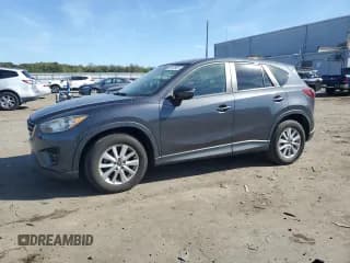 ✅ 2016 Mazda CX-5 Touring • VIN: JM3KE4CY0G0629875 • Lot: 85142835. Listed on Copart with 92,664 mi. Free auction sales archive from the USA and detailed vehicle history report at DreamBid. Image 1.
