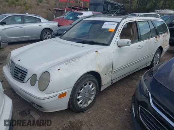 ✅ 2001 Mercedes-Benz E 320/430 4 Matic • VIN: WDBJH82J61X057506 • Lot: 41506666. Listed on IAAI with 304,332 mi. Free auction sales archive from the USA and detailed vehicle history report at DreamBid. Image 2.