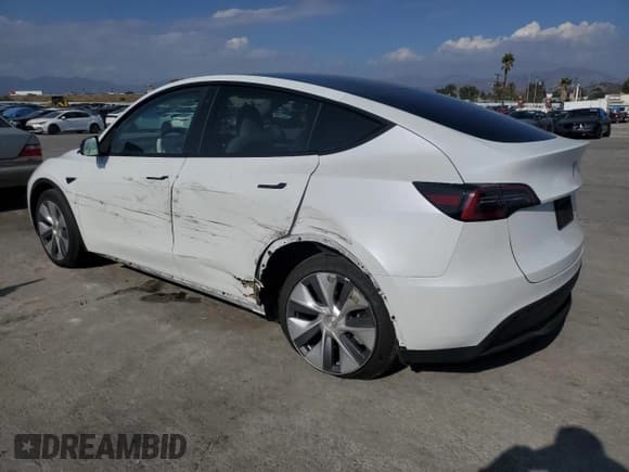 ✅ 2023 Tesla Model Y Long Range • VIN: 7SAYGDEE9PA118473 • Lot: 89553285. Listed on Copart with 25,093 mi. Free auction sales archive from the USA and detailed vehicle history report at DreamBid. Image 2.