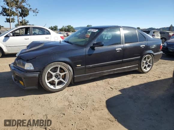 1998 BMW 3 Series M3s with VIN WBSCD9327WEE08697, listed as a Copart auction lot 64621925 with 249,221 mi miles and Salvage title. Bid and sale history available at DreamBid. Image 1.