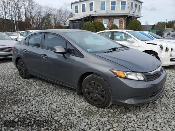 ✅ 2012 Honda Civic LX • VIN: 19XFB2F53CE042998 • Lot: 93971965. Listed on Copart with 230,771 mi. Free auction sales archive from the USA and detailed vehicle history report at DreamBid. Image 4.