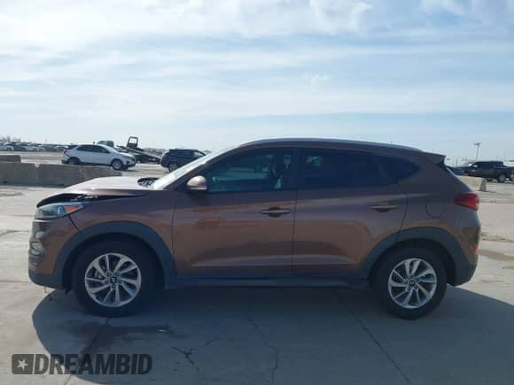 2016 Hyundai Tucson Limited z VIN KM8J33A20GU137662, wystawiony jako IAAI lot #41818149 z przebiegiem 120 010 mil mil oraz . Historia ofert i sprzedaży dostępna na DreamBid. Obrazek 14.