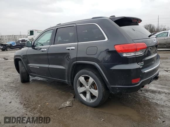 ✅ 2015 Jeep Grand Cherokee Overland • VIN: 1C4RJFCM5FC847707 • Lot: 86420784. Listed on Copart with 124,300 mi. Free auction sales archive from the USA and detailed vehicle history report at DreamBid. Image 2.