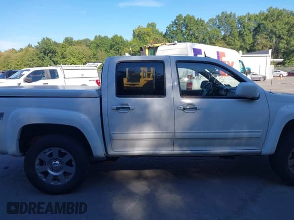 ✅ 2012 Chevrolet Colorado 2LT • VIN: 1GCHTDFE0C8154685 • Лот: 43100193. Опубликован ранее на IAAI с пробегом 193 702 миль. Бесплатный доступ к архиву аукционных продаж из США и подробный отчёт об истории автомобиля на DreamBid. Изображение 13.