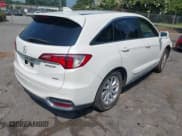 ✅ 2017 Acura RDX • VIN: 5J8TB4H32HL005922 • Lot: 42680888. Listed on IAAI with 104,457 mi. Free auction sales archive from the USA and detailed vehicle history report at DreamBid. Image 4.