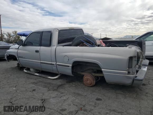 1999 Dodge 1500 с VIN 3B7HC13Z4XG207815, выставлен на аукционе Copart как лот 82229514 с пробегом Не указан миль и Списание • Salvage title. История ставок и продаж доступна на DreamBid. Изображение 2.