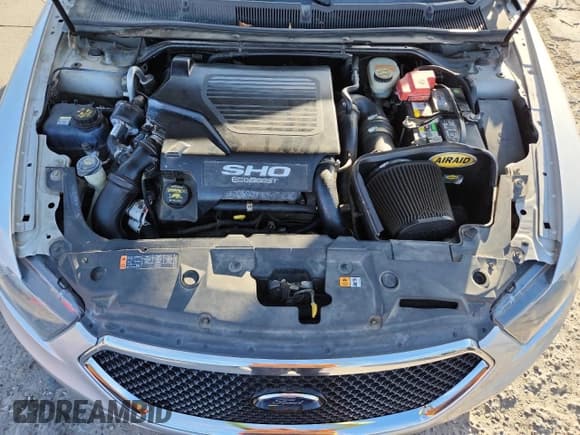 ✅ 2013 Ford Taurus SHO • VIN: 1FAHP2KT1DG112634 • Lot: 89816735. Listed on Copart with 124,134 mi. Free auction sales archive from the USA and detailed vehicle history report at DreamBid. Image 11.