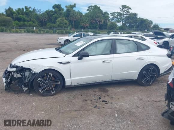 2024 Hyundai Sonata N Line with VIN KMHL54JC2RA418643, listed as a IAAI auction lot 43173088 with 27,398 mi miles and . Bid and sale history available at DreamBid. Image 14.