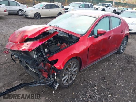 ✅ 2021 Mazda 3 Select • VIN: JM1BPBKL3M1313258 • Lot: 43732790. Listed on IAAI with 34,659 mi. Free auction sales archive from the USA and detailed vehicle history report at DreamBid. Image 18.