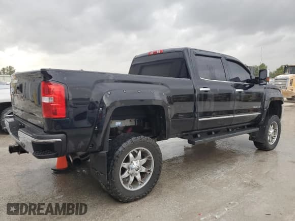 ✅ 2015 GMC Sierra 3500HD SLT • VIN: 1GT423C83FF602881 • Лот: 77644134. Опубликован ранее на Copart с пробегом 257 725 миль. Бесплатный доступ к архиву аукционных продаж из США и подробный отчёт об истории автомобиля на DreamBid. Изображение 3.