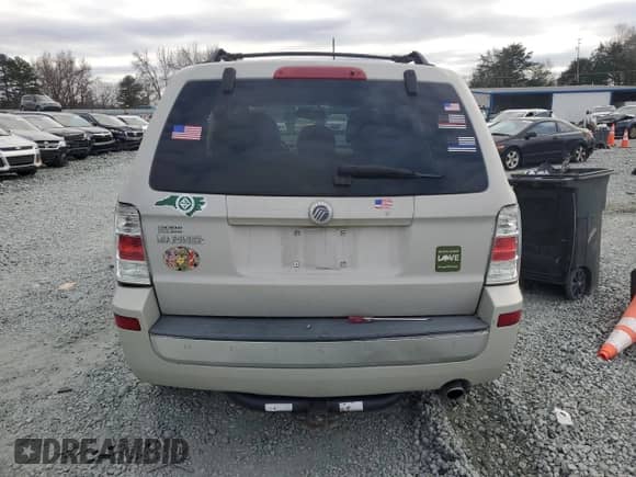2009 Mercury Mariner with VIN 4M2CU81759KJ04555, listed as a Copart auction lot 85778504 with 130,514 mi miles and Salvage title. Bid and sale history available at DreamBid. Image 6.