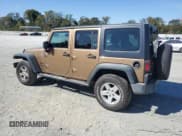 ✅ 2015 Jeep Wrangler Unlimited Sport • VIN: 1C4HJWDG7FL620619 • Лот: 82568875. Опубликован ранее на Copart с пробегом 95 171 миль. Бесплатный доступ к архиву аукционных продаж из США и подробный отчёт об истории автомобиля на DreamBid. Изображение 2.
