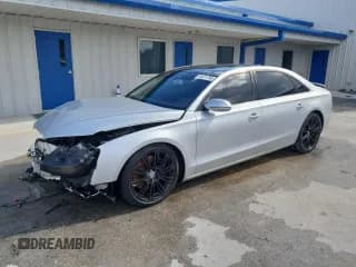 ✅ 2012 Audi A8 • VIN: WAURVAFD7CN018461 • Lot: 93071705. Wystawiony na Copart z przebiegiem 146 036 mil. Bezpłatny archiwum sprzedaży aukcyjnych z USA i szczegółowy raport historii pojazdu na DreamBid. Zdjęcie 1.