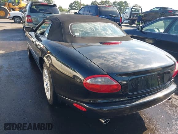 ✅ 2000 Jaguar XK • VIN: SAJJA42C8YNA09810 • Lot: 42855585. Listed on IAAI with Not provided. Free auction sales archive from the USA and detailed vehicle history report at DreamBid. Image 3.
