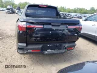 2022 Hyundai Santa Cruz SEL с VIN 5NTJBDAE9NH015673, выставлен на аукционе Copart как лот 66458554 с пробегом 15 874 миль миль и Списание • Salvage title. История ставок и продаж доступна на DreamBid. Изображение 6.
