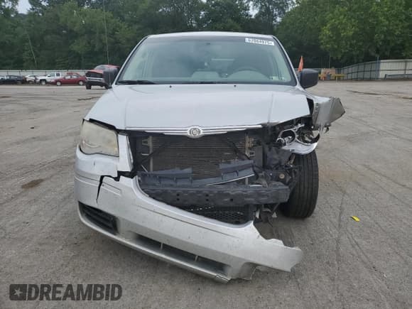 ✅ 2010 Chrysler Town & Country LX • VIN: 2A4RR2D15AR387643 • Lot: 67084975. Wystawiony na Copart z przebiegiem 155 706 mil. Bezpłatny archiwum sprzedaży aukcyjnych z USA i szczegółowy raport historii pojazdu na DreamBid. Zdjęcie 5.