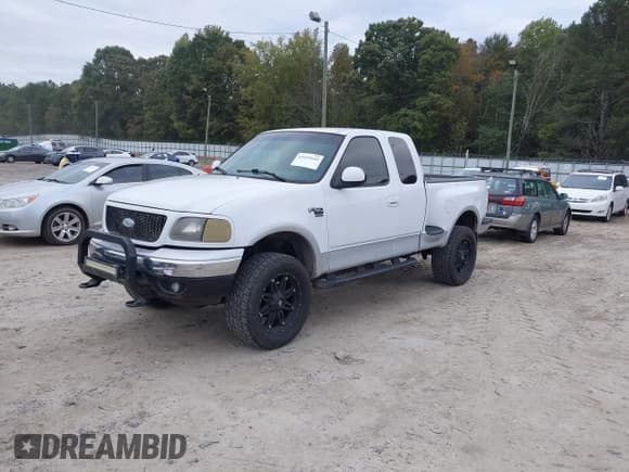 ✅ 2001 Ford F-150 XL • VIN: 2FTRX08L51CA69858 • Lot: 43419644. Listed on IAAI with 215,308 mi. Free auction sales archive from the USA and detailed vehicle history report at DreamBid. Image 2.