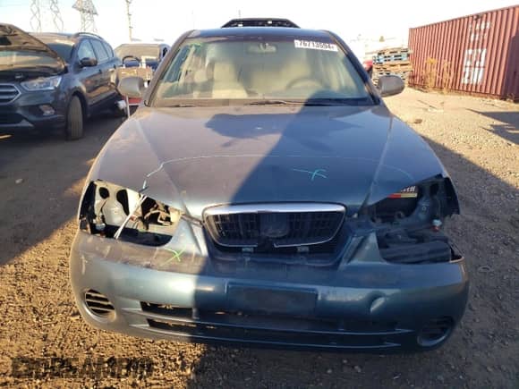 2003 Hyundai Elantra GLS with VIN KMHDN45D83U598594, listed as a Copart auction lot 76713594 with 138,884 mi miles and Salvage title. Bid and sale history available at DreamBid. Image 5.