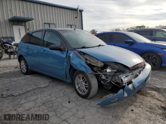 ✅ 2003 Ford Focus ZX5 • VIN: 3FAFP37323R131044 • Lot: 85311235. Wystawiony na Copart z przebiegiem 127 905 mil. Bezpłatny archiwum sprzedaży aukcyjnych z USA i szczegółowy raport historii pojazdu na DreamBid. Zdjęcie 4.
