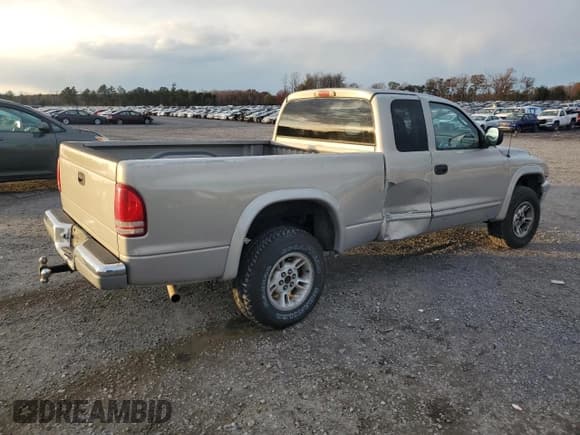 ✅ 1999 Dodge Dakota SLT • VIN: 1B7GG22Y3XS275370 • Lot: 81568994. Wystawiony na Copart z przebiegiem 241 945 mil. Bezpłatny archiwum sprzedaży aukcyjnych z USA i szczegółowy raport historii pojazdu na DreamBid. Zdjęcie 3.