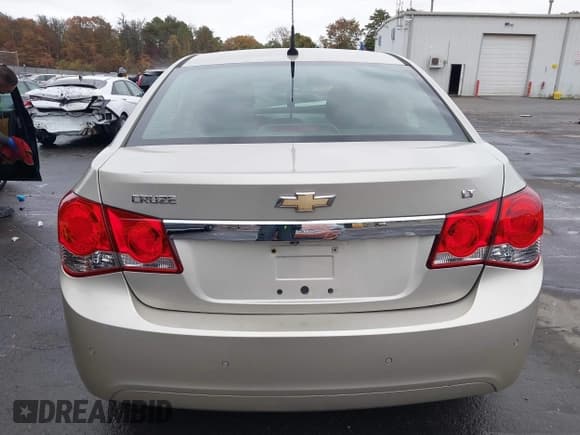 ✅ 2013 Chevrolet Cruze 1LT • VIN: 1G1PC5SBXD7147918 • Lot: 43573003. Listed on IAAI with 79,414 mi. Free auction sales archive from the USA and detailed vehicle history report at DreamBid. Image 17.