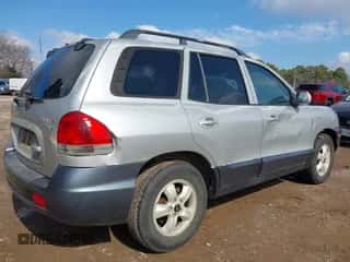 2005 Hyundai Santa Fe GLS z VIN KM8SC13D95U917986, wystawiony jako IAAI lot #41423901 z przebiegiem 163 885 mil mil oraz . Historia ofert i sprzedaży dostępna na DreamBid. Obrazek 4.