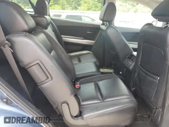 ✅ 2014 Mazda CX-9 Grand Touring • VIN: JM3TB2DV3E0427583 • Lot: 64604875. Wystawiony na Copart z przebiegiem 209 417 mil. Bezpłatny archiwum sprzedaży aukcyjnych z USA i szczegółowy raport historii pojazdu na DreamBid. Zdjęcie 10.