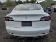 ✅ 2021 Tesla Model 3 Standard Range Plus • VIN: 5YJ3E1EA8MF877025 • Лот: 93459105. Опубликован ранее на Copart с пробегом 33 929 миль. Бесплатный доступ к архиву аукционных продаж из США и подробный отчёт об истории автомобиля на DreamBid. Изображение 6.