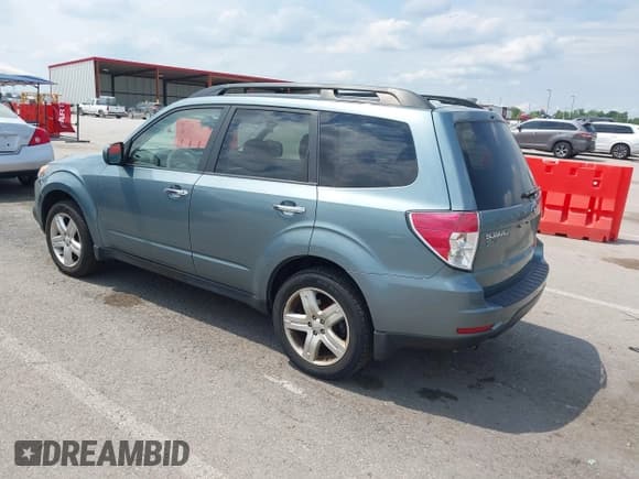 ✅ 2009 Subaru Forester X • VIN: JF2SH63609H766458 • Lot: 42621929. Listed on IAAI with 152,235 mi. Free auction sales archive from the USA and detailed vehicle history report at DreamBid. Image 3.