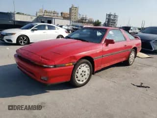 ✅ 1988 Toyota Supra • VIN: JT2MA71JXJ0094266 • Lot: 59028715. Wystawiony na Copart z przebiegiem 133 654 mil. Bezpłatny archiwum sprzedaży aukcyjnych z USA i szczegółowy raport historii pojazdu na DreamBid. Zdjęcie 1.