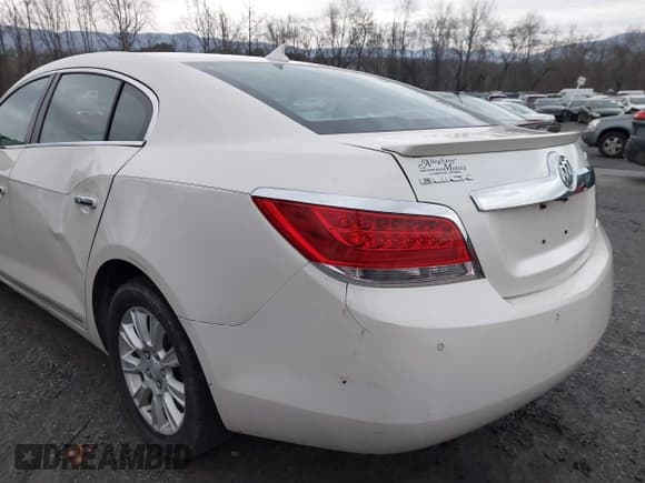 ✅ 2013 Buick LaCrosse Leather • VIN: 1G4GC5GR5DF205559 • Lot: 41439362. Wystawiony na IAAI z przebiegiem 114 953 mil. Bezpłatny archiwum sprzedaży aukcyjnych z USA i szczegółowy raport historii pojazdu na DreamBid. Zdjęcie 18.
