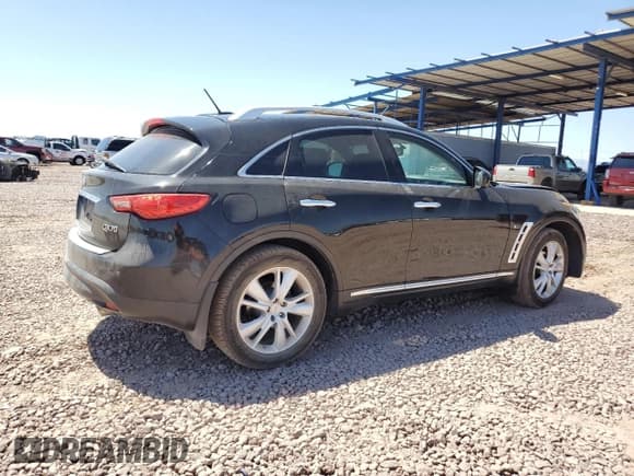 ✅ 2015 Infiniti QX70 • VIN: JN8CS1MW9FM481836 • Lot: 57801425. Listed on Copart with 130,011 mi. Free auction sales archive from the USA and detailed vehicle history report at DreamBid. Image 3.