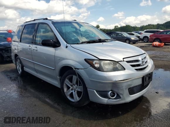 ✅ 2005 Mazda MPV LX • VIN: JM3LW28J650540407 • Lot: 62223774. Listed on Copart with 136,977 mi. Free auction sales archive from the USA and detailed vehicle history report at DreamBid. Image 4.