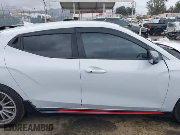 2020 Hyundai Veloster z VIN KMHT36AH1LU005678, wystawiony jako IAAI lot #42054320 z przebiegiem 102 802 mil mil oraz . Historia ofert i sprzedaży dostępna na DreamBid. Obrazek 13.